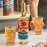 Torani White Peach Flavoring / Fruit Syrup Glass Bottle 750 mL - 12/Case