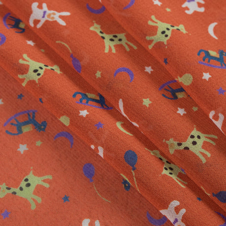 Rocking Horses, Balloons, Giraffes and more Printed on an Orange Chiffon