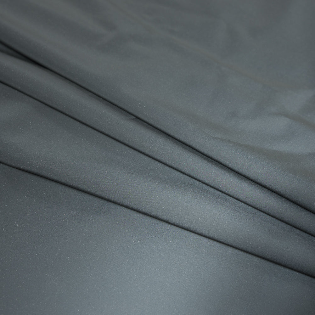 Silver on Black Fleece-Backed Reflective Fabric