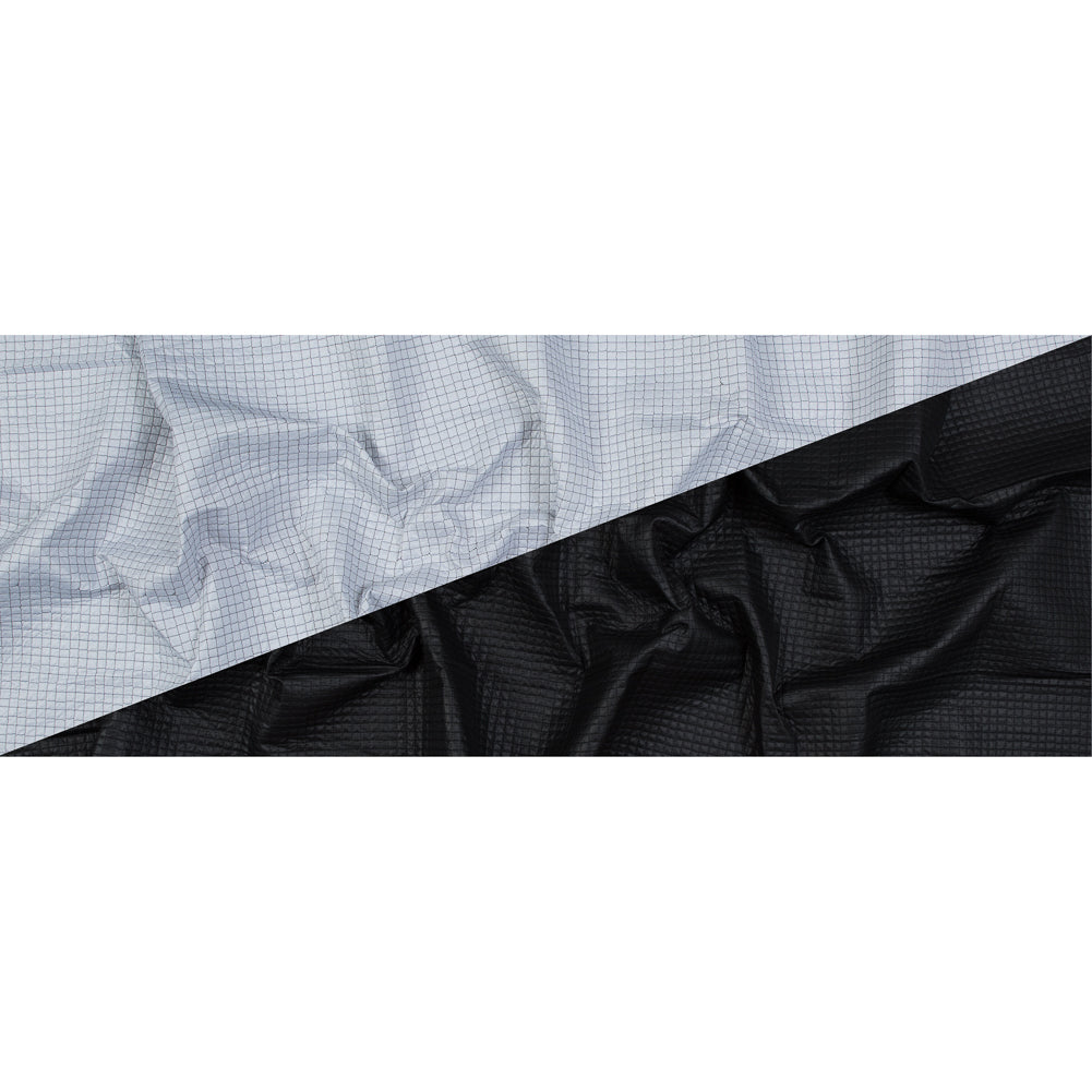 Black and White Reversible Quilted Coating with Filler
