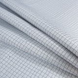 Black and White Reversible Quilted Coating with Filler