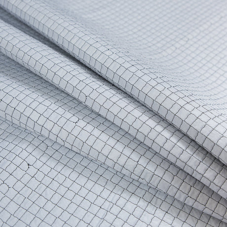 Black and White Reversible Quilted Coating with Filler