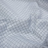 Black and White Reversible Quilted Coating with Filler