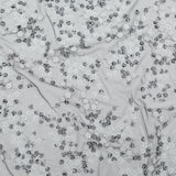 Stretch Net with Sequins - White Fancy Floral Clusters on Black