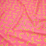 Bananas on Pink Printed Spandex Fabric