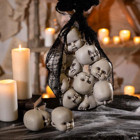 Plastic Halloween Doll Heads Set in Mesh Bag for Prop Making, featuring a haunted Halloween doll design