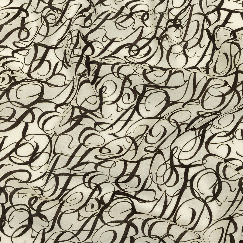 Sustainable Viscose Woven Print - White Calligraphic Letters - Mood Exclusive Dear Ms. Austen