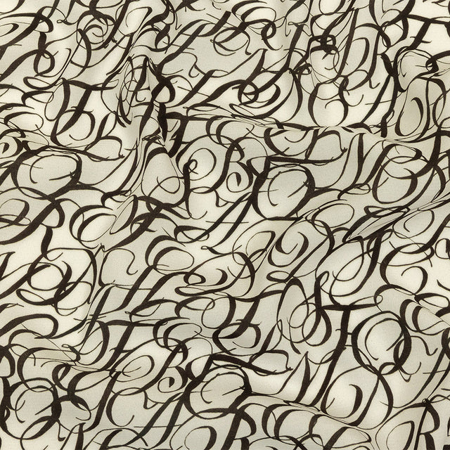 Sustainable Viscose Woven Print - White Calligraphic Letters - Mood Exclusive Dear Ms. Austen