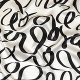 Mood Exclusive Italian Blanc de Blanc and Caviar Calligraphic Squiggles Silk Charmeuse
