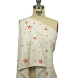 Cloud Dancer and Coral Almond Stars Stretch Polyester and Rayon French Terry