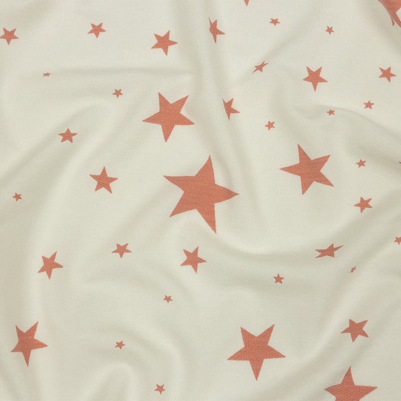 Cloud Dancer and Coral Almond Stars Stretch Polyester and Rayon French Terry