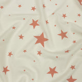 Cloud Dancer and Coral Almond Stars Stretch Polyester and Rayon French Terry