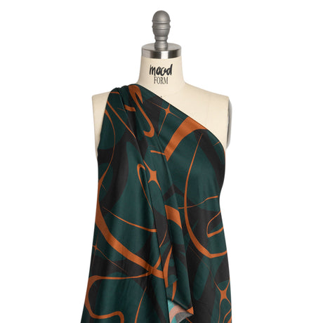 Sustainable and Recycled Viscose Satin Print - Forest Green and Orange Swirling Abstract - Mood Exclusive Atmospheric Adventure
