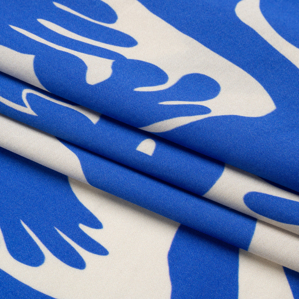 Sustainable and Recycled Viscose Satin Print - Blue and White Hands - Mood Exclusive Helping Hands