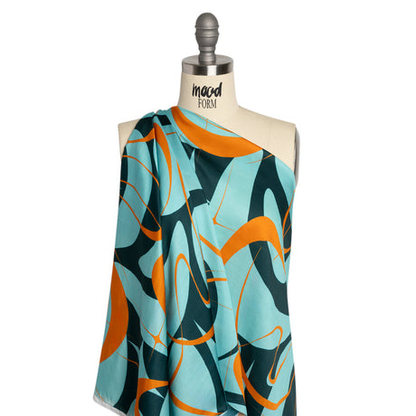 Sustainable and Recycled Viscose Satin Print - Turquoise and Orange Swirling Abstract - Mood Exclusive Atmospheric Adventure