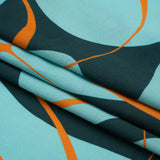 Sustainable and Recycled Viscose Satin Print - Turquoise and Orange Swirling Abstract - Mood Exclusive Atmospheric Adventure
