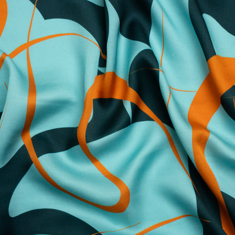 Sustainable and Recycled Viscose Satin Print - Turquoise and Orange Swirling Abstract - Mood Exclusive Atmospheric Adventure