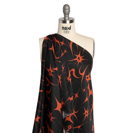 Sustainable and Recycled Viscose Satin Print - Black and Red Abstracting Stars - Mood Exclusive Speed of Light
