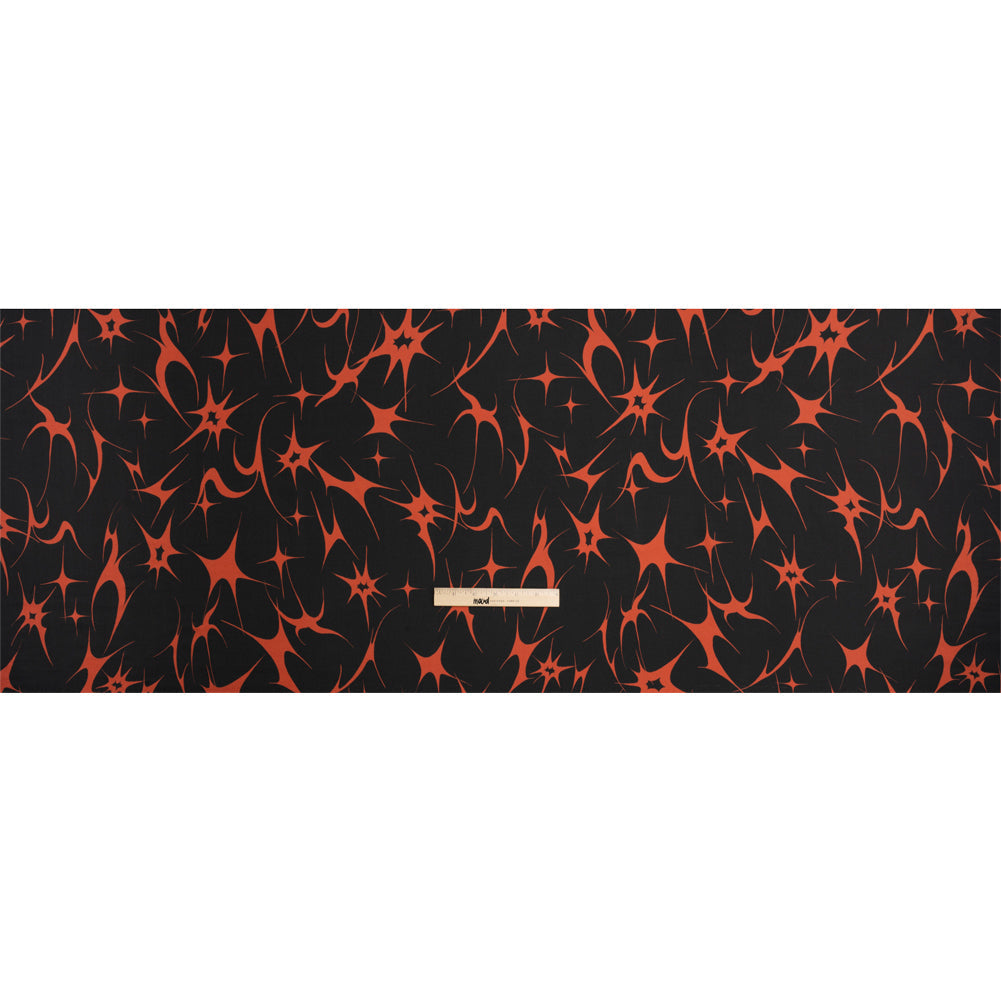 Sustainable and Recycled Viscose Satin Print - Black and Red Abstracting Stars - Mood Exclusive Speed of Light