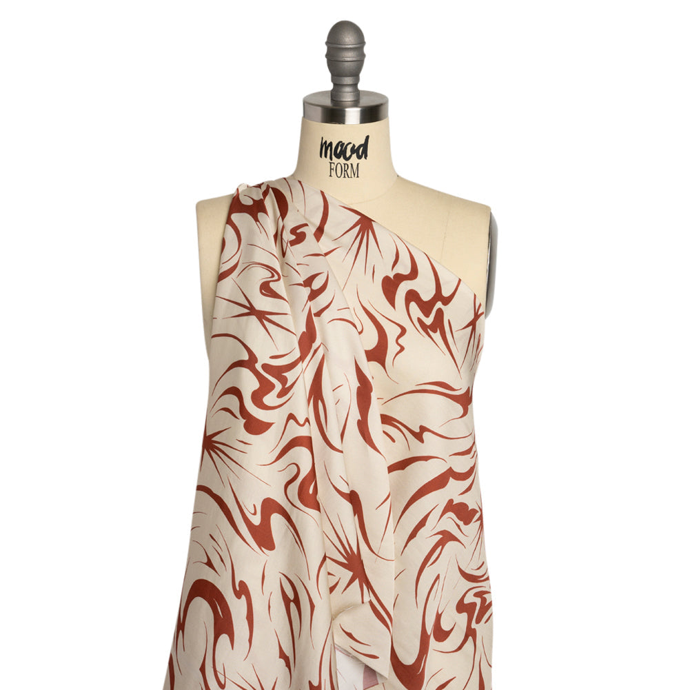 Sustainable and Recycled Viscose Satin Print - Red and Cream Swirls and Stars - Mood Exclusive Vincent's Hope