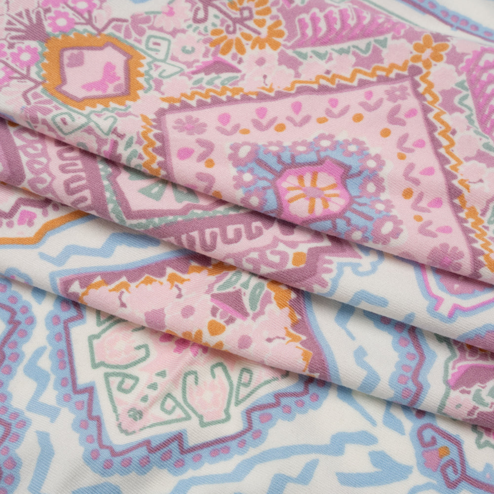 Stretch Polyester Jersey - Pale Pink, Baby Blue, and Golden Yellow Geometric Medallions