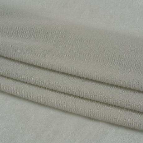Honeydew green lightweight cotton interlock knit fabric