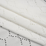 Stretch Polyester Jersey with Eyelets - White Circles - Designer Deadstock