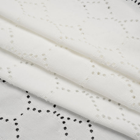 Stretch Polyester Jersey with Eyelets - White Circles - Designer Deadstock