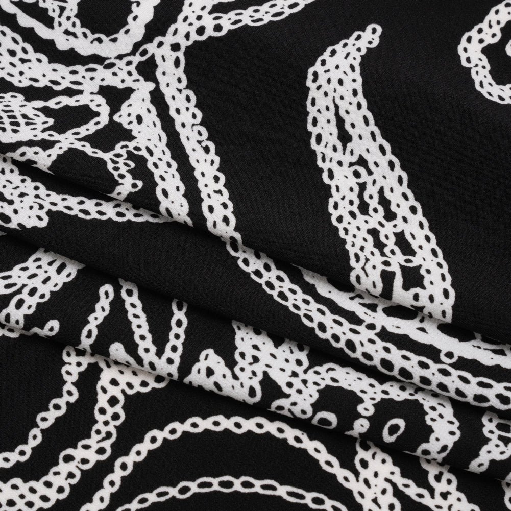 Stretch Polyester Tricot - Black and White Chain Stitch Flowers - Designer Deadstock