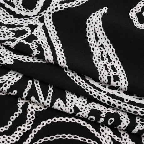 Stretch Polyester Tricot - Black and White Chain Stitch Flowers - Designer Deadstock