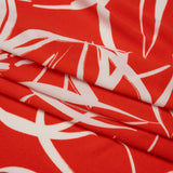 Stretch Polyester Tricot - Orange Red and White Flowers and Leaves - Designer Deadstock