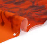 Satin-Faced Rayon Twill - Orange and Black Hazy Florals - Made in Italy
