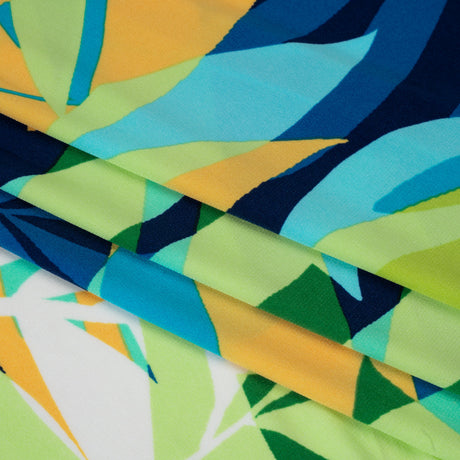 Stretch Polyester Tricot - Green, Blue and Goldenrod Overlapping Palm Leaves - Designer Deadstock