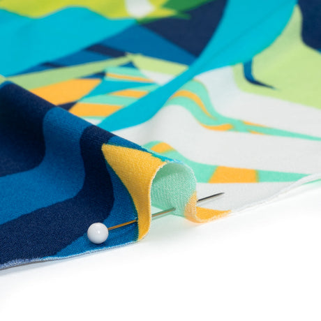 Stretch Polyester Tricot - Green, Blue and Goldenrod Overlapping Palm Leaves - Designer Deadstock