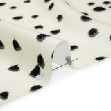 Viscose Crepe - Cream and Black Shadowed Spots - Mood Exclusive Peppered Paws Print