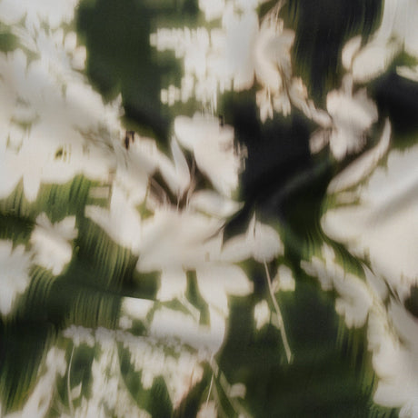 Polyester Mikado - Green and White Ikat Floral Silhouettes - Mood Exclusive Glowscape Garden Print