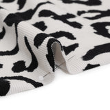 Stretch Cotton 2x2 Rib Knit Print - Black and White Big Leopard Spots - Deadstock