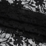 Polyester Raschel Lace - Black Flowers and Ribbons - Designer Deadstock