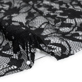 Polyester Raschel Lace - Black Flowers and Ribbons - Designer Deadstock