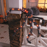 4 Ft. 3" Light-Up Fuzzy Black Spider Halloween Decoration