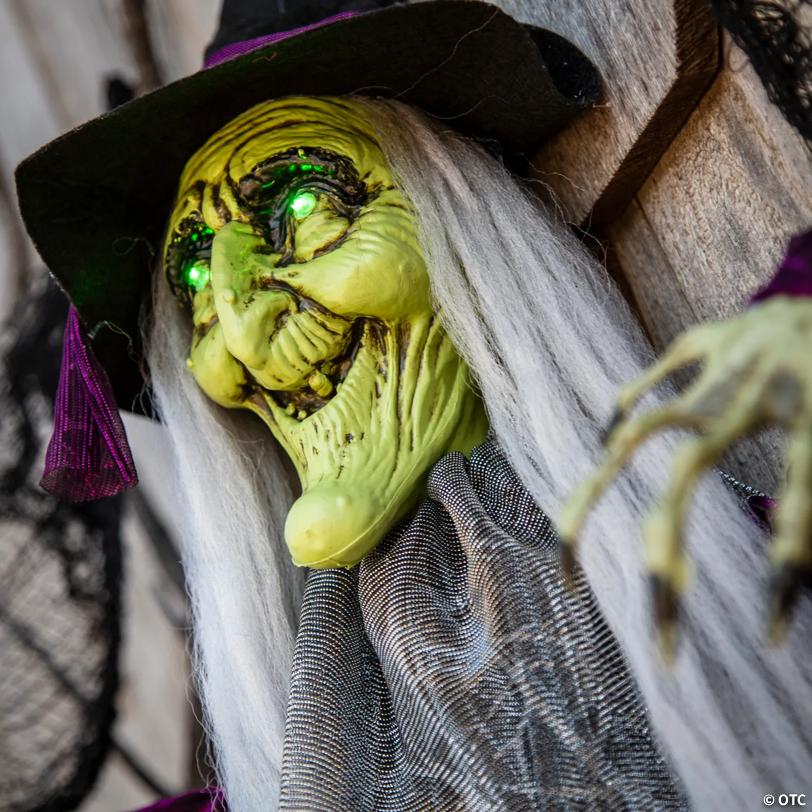4 Ft. Hanging Witch with Green Eyes Animated Prop Halloween Decoration