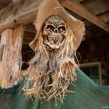 Hanging Animated Skeleton Witch Halloween Decoration with Light-Up Eyes, lights up for a spooky Halloween night display