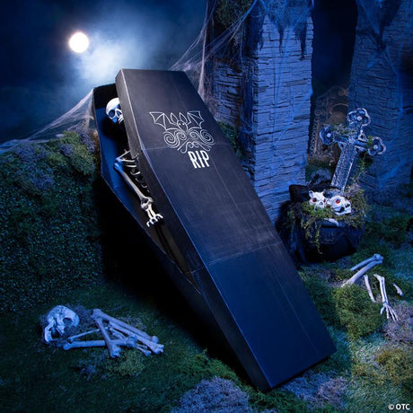 Posable Skeleton with Cardboard Coffin Halloween Decorating Kit, showing a detailed skeletal bone design