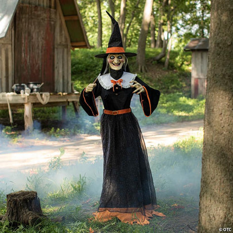Animated Witch Halloween Decoration with Moving Head and LED Lights, lights up for a spooky Halloween night display