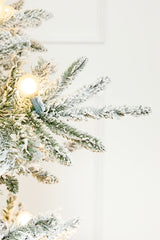 7' Flocked Christmas Tree with 63 G40 LED Lights