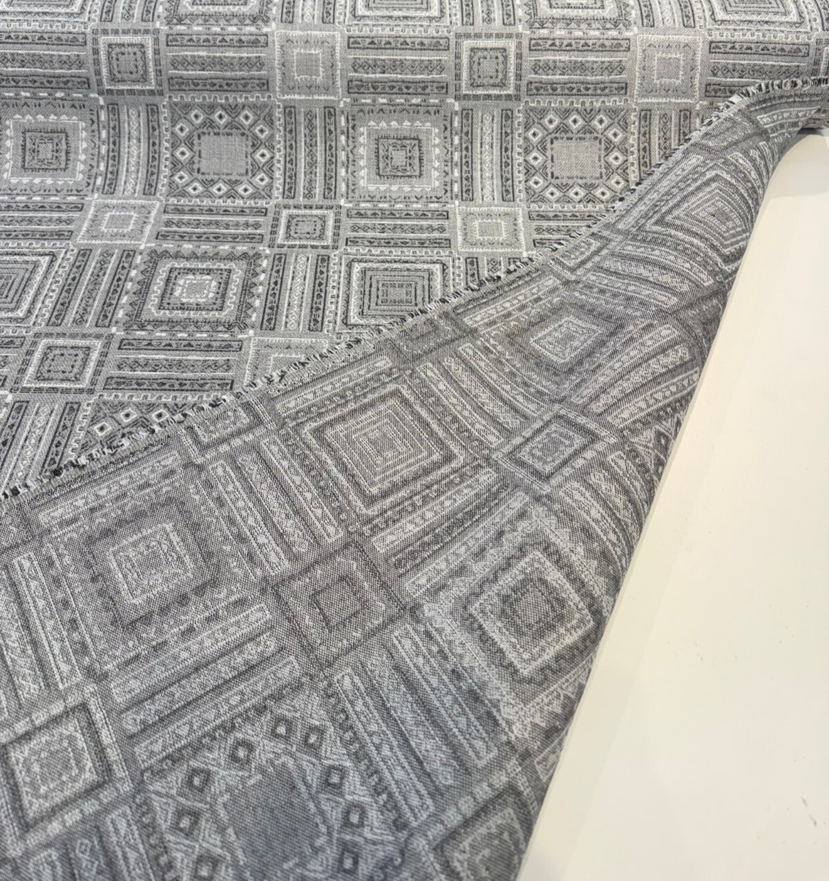Sunbrella Garza Gray Fog Acrylic Fabric - Gray, Black Geometric Pattern, 56" Width (1 Yard)