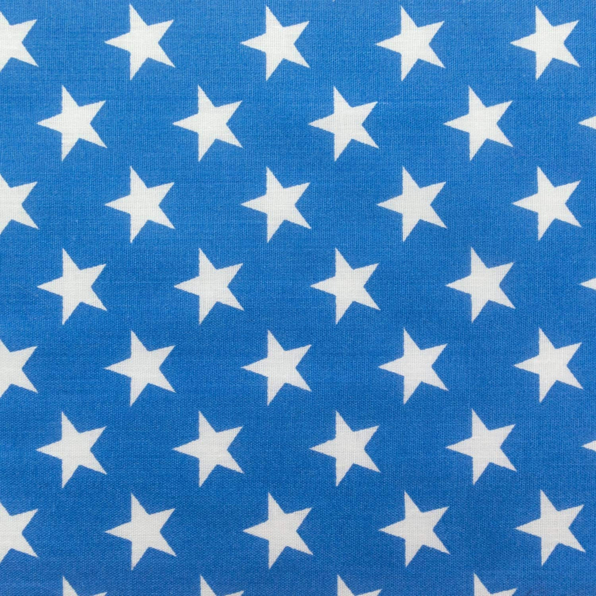 White Stars on Blue Poly Cotton Fabric,