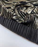 Polyester Elastane Plissé Fabric in Golden Black