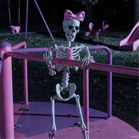 Bella Bones Posable Skeleton Halloween Decoration with Bows and Hearts, showing a detailed skeletal bone design
