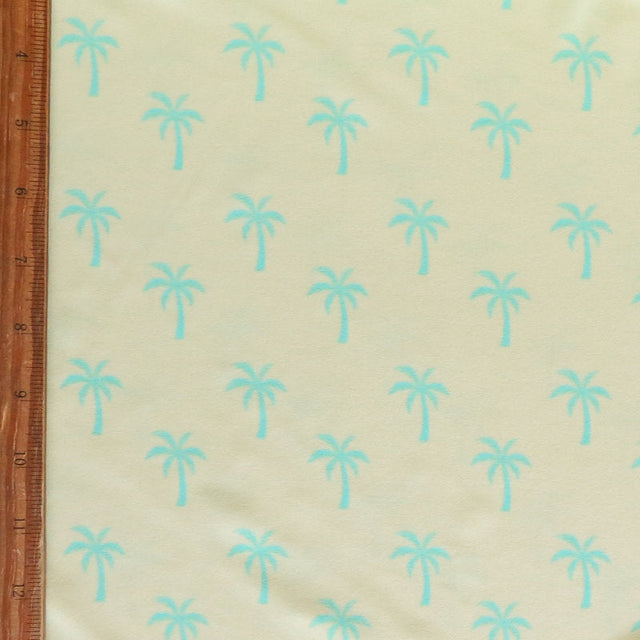 Poly Spandex Swimsuit Fabric Bright Blue Palms on Light Yellow